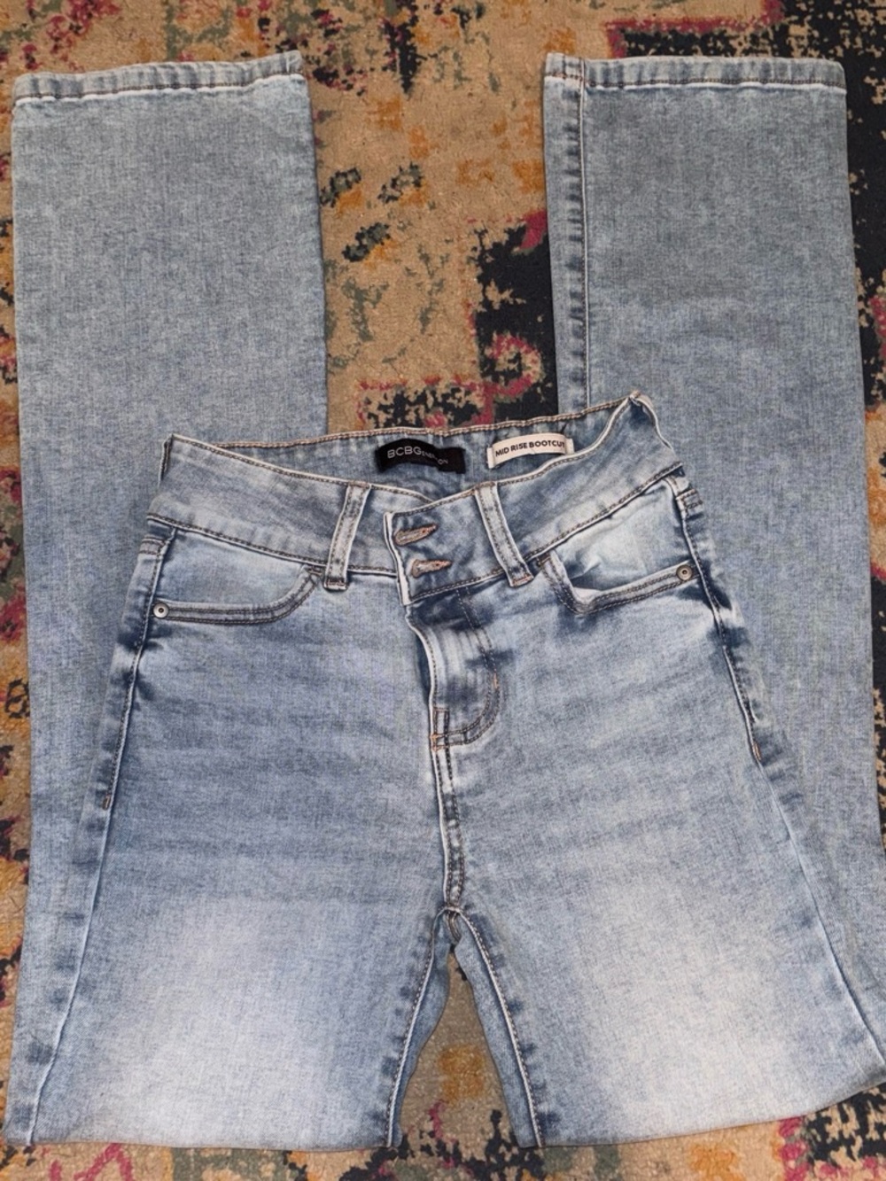 BCBGeneration Faded Light Blue High-Rise Bootcut Jeans